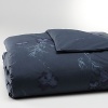 Edo-period inspired irises on rice paper done with grey bamboo printed on percale in colors of late evening. Duvet has hidden button closure. Duvets and shams are self-reversing.