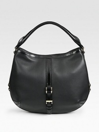 A rounded top handle silhouette of perforated leather, finished with sleek matte trim and a buckled detail.Top handle, 5 dropTop zip closureOne inside zip pocketTwo inside open pocketsFully lined16½W X 13½H X 1¾DMade in Italy A rounded top handle silhouette of perforated leather, finished with sleek matte trim and a buckled detail.Top handle, 5 dropTop zip closureOne inside zip pocketTwo inside open pocketsFully lined16½W X 13½H X 1¾DMade in Italy