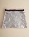 An adorably shiny party skirt for the apple of your eye, this metallic mini features a contrast ribbon and faux front pockets.