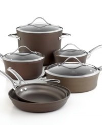 Nice accent! Style-setting bronze quickly becomes every chef's favorite with subtle coloring and a strong, durable construction that sets the kitchen up for success. A multi-layer nonstick finish and heavy-gauge hard-anodized aluminum design make cleaning up no big deal and cooking a masterpiece an everyday thing. Lifetime warranty. Nice accent! Style-setting bronze quickly becomes every chef's favorite with subtle coloring and a strong, durable construction that sets the kitchen up for success. A multi-layer nonstick finish and heavy-gauge hard-anodized aluminum design make cleaning up no big deal and cooking a masterpiece an everyday thing. Lifetime warranty.