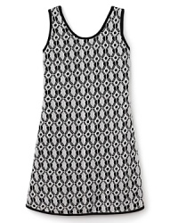 Cute in crochet, this Sally Miller girls' dress features an open back, neatly wrapped up with a girlish ribbon. Cute in crochet, this Sally Miller girls' dress features an open back, neatly wrapped up with a girlish ribbon.