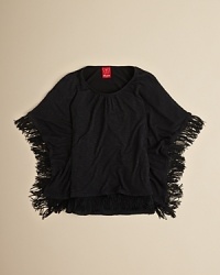 This fringed poncho is a cool way to add new proportions and desert-inspired style to her casual wardrobe. This fringed poncho is a cool way to add new proportions and desert-inspired style to her casual wardrobe.