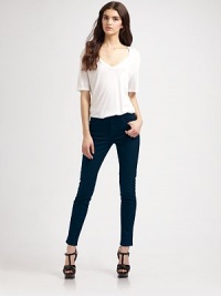 Daringly dark rinse and skinny-leg construction define this high-rise denim look. THE FITHigh-rise Skinny leg Rise, about 9½ Inseam, about 28½THE DETAILSZip fly Button closure Four-pocket style 92% cotton/7% polyester/1% spandex Machine wash Made in USA of imported fabric Daringly dark rinse and skinny-leg construction define this high-rise denim look. THE FITHigh-rise Skinny leg Rise, about 9½ Inseam, about 28½THE DETAILSZip fly Button closure Four-pocket style 92% cotton/7% polyester/1% spandex Machine wash Made in USA of imported fabric