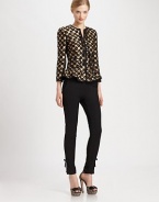 Featuring a peplum waist, one of the hottest trends of the season, this leopard-print jacquard jacket with metallic accents, is beyond eye-catching.Round collarLong sleevesSelf-tie detail at necklineFront zipperPrincess seamsPatch pocketsPeplum waistAbout 21 from shoulder to hem56% polyester/30% acetate/11% wool/3% polyamideDry cleanMade in Italy of imported fabric