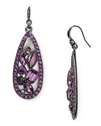 Spectacular purple stones add dressed-up drama to this pair of Carolee Lux stone drop earrings, which work a darker side of glamour, plated in hematite. Spectacular purple stones add dressed-up drama to this pair of Carolee Lux stone drop earrings, which work a darker side of glamour, plated in hematite.