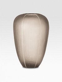 A modern urban treasure, mouthblown in artisanal glass with hand-etched detail and a gently textured surface. Glass10 highHand washImported