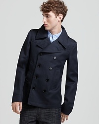 Rendered in a linen and cotton fabrication, the Burberry London Leagrove peacoat offers timeless, transitional style, presented with clean lines and a tailored silhouette. Rendered in a linen and cotton fabrication, the Burberry London Leagrove peacoat offers timeless, transitional style, presented with clean lines and a tailored silhouette.