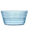 Like dewdrops in the morning sun, the bubbles circling iittala's Kastehelmi serving bowl glisten in pressed glass to reflect all the light at your table. A watery blue hue adds to the tranquil nature of the vintage Oiva Toikka design.