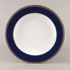 Embellished with intricate garlands, oval links and a fanciful dragon motif, this Wedgwood dinnerware evokes Europe's glorious Renaissance period. Rendered in deep blue and gold to transform any formal meal into a spectacular royal gala.