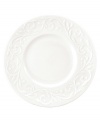 An elegant white-on-white pattern, embossed vine motif and interior glaze adorn these dessert plates from Lenox dinnerware. The dishes from the Opal Innocence Carved collection get your table set for refined dining every day.