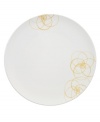A modern canvas for everyday meals, the Bloom Sun round platter has a smooth, flat surface that's artfully scribbled with golden florals for a look that's fresh – and in durable porcelain – not fussy. From Villeroy & Boch.
