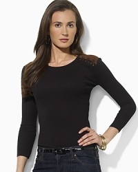Cut in a relaxed, feminine silhouette, a supremely soft ribbed cotton top is finished with faux-suede patches and stitching at the shoulders for a chic, rustic vibe. Cut in a relaxed, feminine silhouette, a supremely soft ribbed cotton top is finished with faux-suede patches and stitching at the shoulders for a chic, rustic vibe.