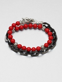 This chain link and beaded, multi-row design of stainless steel and sterling silver is embellished with red coral for a colorful, charismatic touch.Stainless steel/sterling silverCoralAbout 3 diam.Imported This chain link and beaded, multi-row design of stainless steel and sterling silver is embellished with red coral for a colorful, charismatic touch.Stainless steel/sterling silverCoralAbout 3 diam.Imported