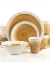 Serene and understated, Sango's Newport Beige dinnerware set is handcrafted with raised dots and tan accents on a body of glazed white stoneware.