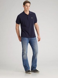 Five-pocket Italian cotton denim in a medium wash has fading and whiskering to create well-worn character. Low waist Button fly Logo leather patch at back waist Leather detail on back pockets Inseam, about 32 Cotton; machine wash Imported Five-pocket Italian cotton denim in a medium wash has fading and whiskering to create well-worn character. Low waist Button fly Logo leather patch at back waist Leather detail on back pockets Inseam, about 32 Cotton; machine wash Imported