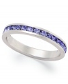 Traditions beautiful stacking ring is perfect when paired with other slim rings, but makes a pretty sparkling statement all its own. Crafted in sterling silver, a thin band features a row of round-cut purple crystals with Swarovski elements. Size 5-10.