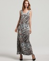 Give into the animal attraction of this Karen Kane maxi dress--long and lean, in an exotic print.