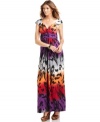 A fiercely chic animal-print maxi dress from NY Collection takes a surprisingly playful turn in a palette of bright colors. The flattering cut and sultry wide neckline ensure that this look always attracts attention.