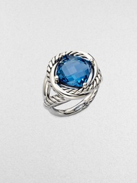 From the Infinity Collection. A richly colored, faceted blue topaz in a setting formed of intertwining smooth bands and cables of sterling silver.Blue topazSterling silverDiameter, about ½Imported From the Infinity Collection. A richly colored, faceted blue topaz in a setting formed of intertwining smooth bands and cables of sterling silver.Blue topazSterling silverDiameter, about ½Imported