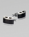 Rectangular, stainless steel cuff links with carbon inlay.Stainless steelT-back closureAbout ¾ x ½Imported