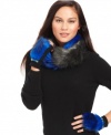 Luxe and lovely. Give your winter look a pop of panache with this fabulous, faux fur infinity scarf from Juicy Couture. Cobalt blue and ebony entwine to create this completely covet-worthy design.