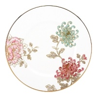 Painted Camellia brings vintage florals to life with just the right amount of color to make the dinner table unique. Draped against a gold-rimmed white canvas, delicate painted florals create a beautiful melodic feel. The salad plate, defined by a rich black background, is artfully juxtaposed to its white-bodied counterpart for a dramatic contrast.