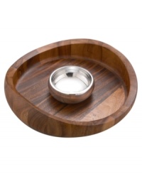 With elegant swooping edges crafted in luxurious acacia wood, this chip and dip dish from Nambe's collection of serveware and serving dishes mimics the grace and beauty of a butterfly in flight. A smart dip bowl, sculpted in gleaming metal alloy, maintains the temperature of whatever snack you're serving. With elegant swooping edges crafted in luxurious acacia wood, this chip and dip dish from Nambe's collection of serveware and serving dishes mimics the grace and beauty of a butterfly in flight. A smart dip bowl, sculpted in gleaming metal alloy, maintains the temperature of whatever snack you're serving.