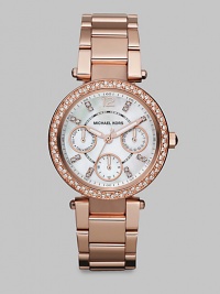 From the Parker Collection. Truly sparkle in this technical timepiece with Swarovski crystal accents. Quartz movementWater resistant to 10 ATMRound rose goldtone stainless steel case, 33mm (1.3) Swarovski crystal accented bezelSilvertone dialNumeric and Swarovski crystal hour markersThree multi-function sub-dialsSecond hand Rose goldtone stainless steel link braceletImported