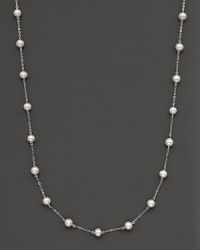 Beaded 14 Kt. white gold necklace with fresh water pearl stations. Beaded 14 Kt. white gold necklace with fresh water pearl stations.
