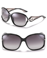 Large oversized sunglasses with with circular open metal temples for a glamorous touch. Large oversized sunglasses with with circular open metal temples for a glamorous touch.