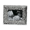 This hydrangea frame from renown metal designer Michael Aram fits perfectly with any home décor. The silverplated and tarnish resistant frame holds one 5x7 photograph. Frame measures 10.25 x 8.25.