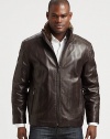 A polished leather jacket is a powerful style statement and this structured silhouette gets a refreshing update with a detachable rabbit-fur lining for a look that exudes masculine cool.Zip frontStand collarSide slash pocketsAbout 28 from shoulder to hemLeatherDry cleanImportedFur origin: China