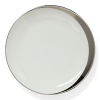 A hand-painted crescent of stunning platinum rims the edges of this thoroughly modern dinnerware collection.