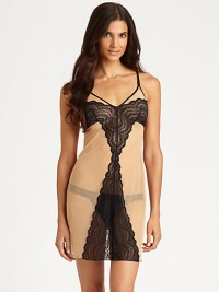 Sheer, peek-a-boo lace trims this delicate slip in alluring detail.Spaghetti strapsV-neckContour Empire waist83% nylon/15% elastane/2% cottonHand washMade in Italy Sheer, peek-a-boo lace trims this delicate slip in alluring detail.Spaghetti strapsV-neckContour Empire waist83% nylon/15% elastane/2% cottonHand washMade in Italy