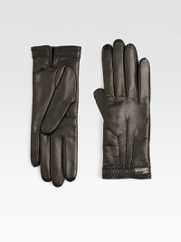 Warm, fancy fingers in supple leather with cashmere lining and a few stylish details.About 9.25 longPerforated trimDarted detailsLogo plateCashmere linedLeatherDry cleanMade in Italy Warm, fancy fingers in supple leather with cashmere lining and a few stylish details.About 9.25 longPerforated trimDarted detailsLogo plateCashmere linedLeatherDry cleanMade in Italy