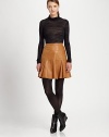 Unbelievably soft, thanks to its lamb leather fabrication, this flared skirt is a chic update of a fashion classic.Waist dartsPleated hemBack zipperFully linedAbout 18 longLamb leatherDry clean by leather specialistImported of Italian fabricModel shown is 5'10½ (179cm) wearing US size 4. 