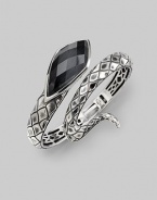 From the Jewels Verne Collection. A coil of crosshatched sterling silver with a faceted grey cat's eye and quartz stone.Cat's eye Quartz Sterling silver Diameter, about 2½ Imported 