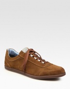 Sporty styling in supple Italian sueded calfskin elevates your casual wardrobe.Padded insoleRubber soleMade in Italy