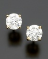 A full carat of round-cut diamond, these stud earrings are a timeless gift she will cherish forever. Set in 14k gold, with glittering round-cut diamond (1 ct. t.w.).