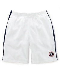 A preppy short rendered from soft cotton mesh is accented with side-seam stripes and a signature Ralph Lauren pony emblem, celebrating Team USA's participation in the 2012 Olympics. A preppy short rendered from soft cotton mesh is accented with side-seam stripes and a signature Ralph Lauren pony emblem, celebrating Team USA's participation in the 2012 Olympics.