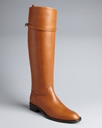 Ride on: this Salvatore Ferragamo gets top marks for polished equestrian style, accented with gold metal logo details. Ride on: this Salvatore Ferragamo gets top marks for polished equestrian style, accented with gold metal logo details.