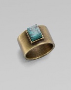 A structural piece with a square, center turquoise stone. TurquoiseBrassWidth, about ½Made in USA