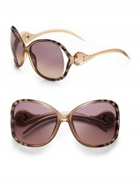 Tubular acetate frames with open lens is adorned with a signature Cavalli emblem at temple. Available in gradient gold on zebra with grey/sand gradient lens or rose gold/pearl rose with grey/sand gradient lens. 100% UV protection Made in Italy Tubular acetate frames with open lens is adorned with a signature Cavalli emblem at temple. Available in gradient gold on zebra with grey/sand gradient lens or rose gold/pearl rose with grey/sand gradient lens. 100% UV protection Made in Italy