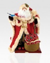 Exquisitely crafted by hand of fabric and wood, this rustic, woodland Santa, draped in fur, with a soft flowing beard, is a keepsake indeed, to become a treasured part of your holiday decor for years to come.Handmade and hand-paintedFabric and woodStands on a polished wood base24HImported