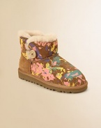 This paint splattered mini version of the Bailey boot is a stylish, warm and fuzzy dream come true for tiny feet.Logo button-and-loop closureSheepskin upperSheepskin liningMolded EVA sole is light and flexiblePadded insoleImported