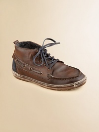 A high-top design with boat shoe detail in distressed leather with a rubber sole and eagle logo.Lace-upLeather upper60% polyester/40% acrylic liningRubber solePadded insoleImported A high-top design with boat shoe detail in distressed leather with a rubber sole and eagle logo.Lace-upLeather upper60% polyester/40% acrylic liningRubber solePadded insoleImported