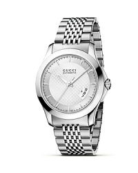 A diamante patterned dial lends Gucci's signature look to this timeless watch, crafted in stainless steel. A diamante patterned dial lends Gucci's signature look to this timeless watch, crafted in stainless steel.