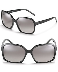 Lounge pool-side in these chic oversized square sunglasses from Fendi.