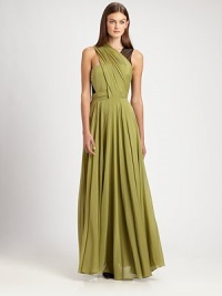 This goddess-like gown of pure silk is gorgeously simple, with a diagonal pleated bodice and a sheer contrast back for a little extra allure.Crossover necklineSleevelessDraped bodiceSheer chiffon backFlowing, flared skirtSide zip closureSilk liningAbout 46 from natural waistSilkDry cleanImportedSIZE & FITModel shown is 5'10 (177cm) wearing US size 4. This goddess-like gown of pure silk is gorgeously simple, with a diagonal pleated bodice and a sheer contrast back for a little extra allure.Crossover necklineSleevelessDraped bodiceSheer chiffon backFlowing, flared skirtSide zip closureSilk liningAbout 46 from natural waistSilkDry cleanImportedSIZE & FITModel shown is 5'10 (177cm) wearing US size 4.