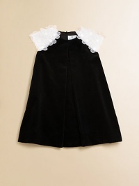 A precious velvet dress is defined by beautiful floral organza sleeves and a front and back pleat.JewelneckOrganza flower sleevesBack zipperCottonDry cleanImported A precious velvet dress is defined by beautiful floral organza sleeves and a front and back pleat.JewelneckOrganza flower sleevesBack zipperCottonDry cleanImported